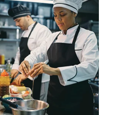 Two chefs in a kitchen, one of them is a woman. AI generated content