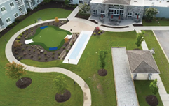 A man in a green shirt is playing golf on a green course. AI generated content
